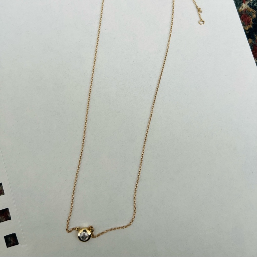 14 k yellow gold with diamond bezel set